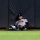 Illustration for article titled George Springer Carted Off After Smashing Head Into Outfield Wall During Acrobatic Catch